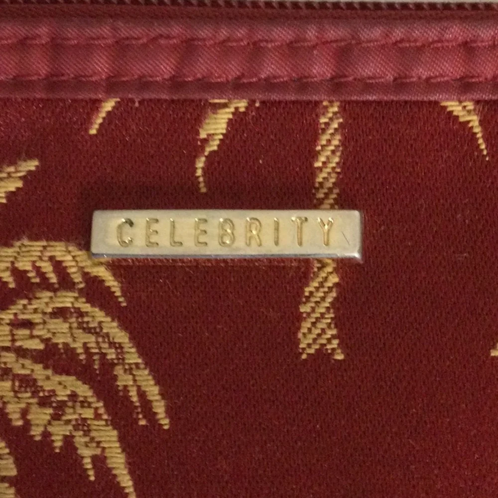 Celebrity Gold Palm-Print Pouch in Burgundy